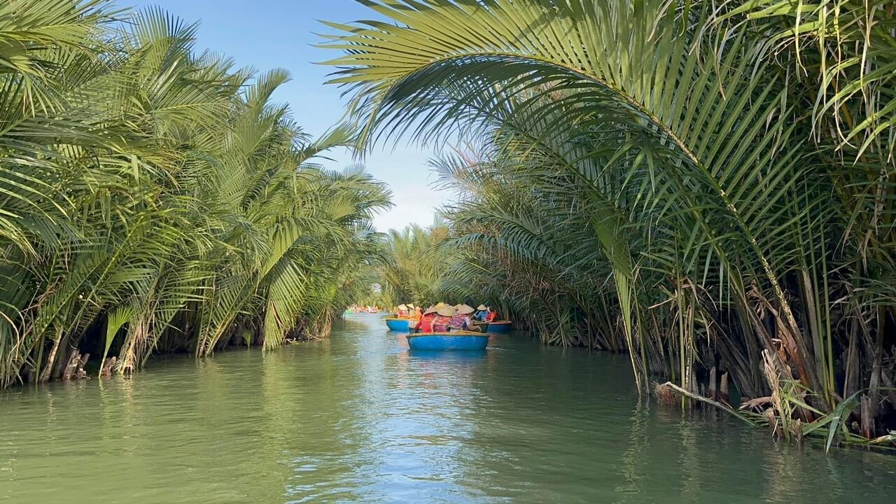 hoi an basket boat paddling through coconut village